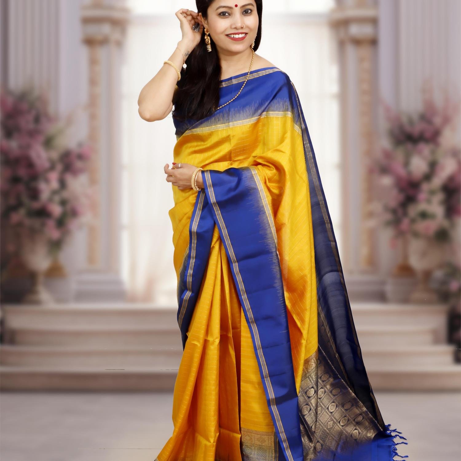 Handwoven Kanchipuram Silk Saree – Yellow Base with Dark Blue Border & Golden Zari