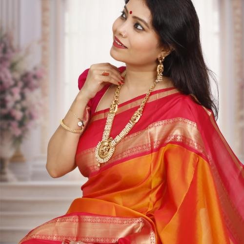 Handwoven Kanchipuram Silk Saree – Orange Base with Rani Pink & Golden Zari Border