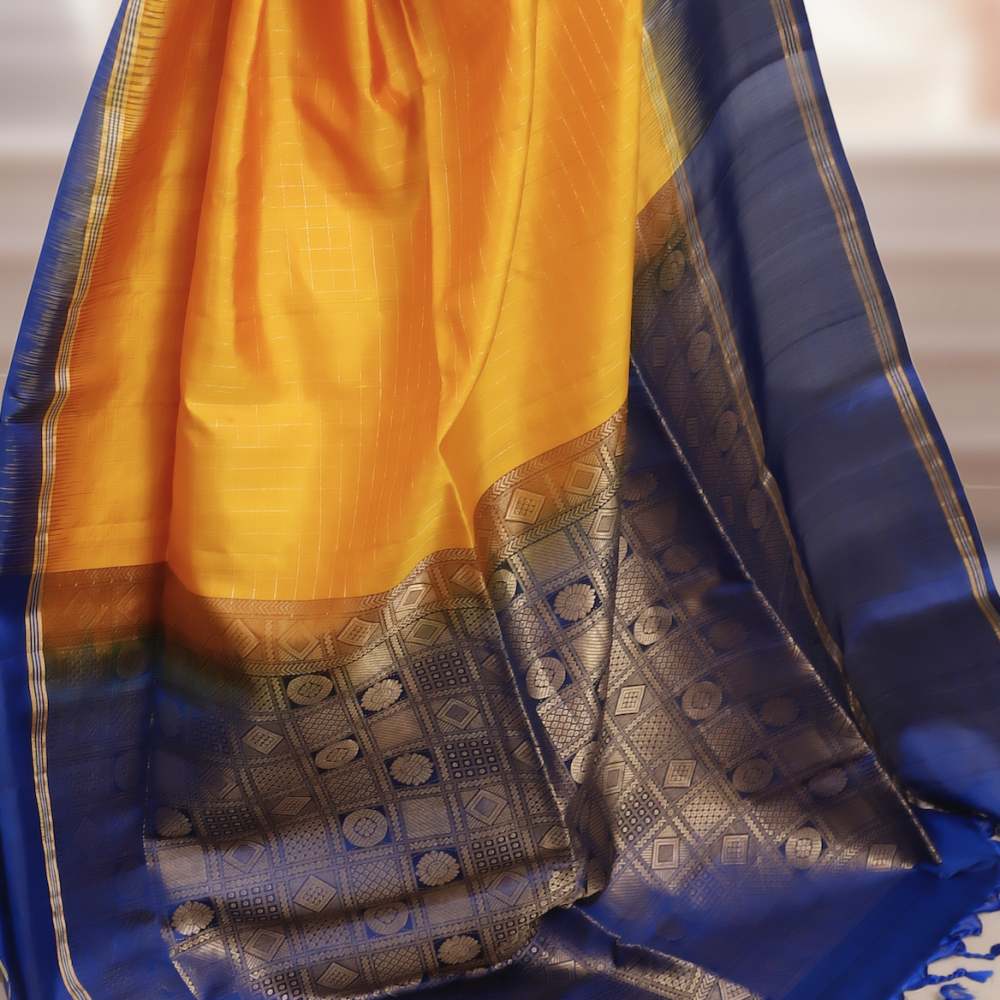 Handwoven Kanchipuram Silk Saree – Yellow Base with Dark Blue Border & Golden Zari