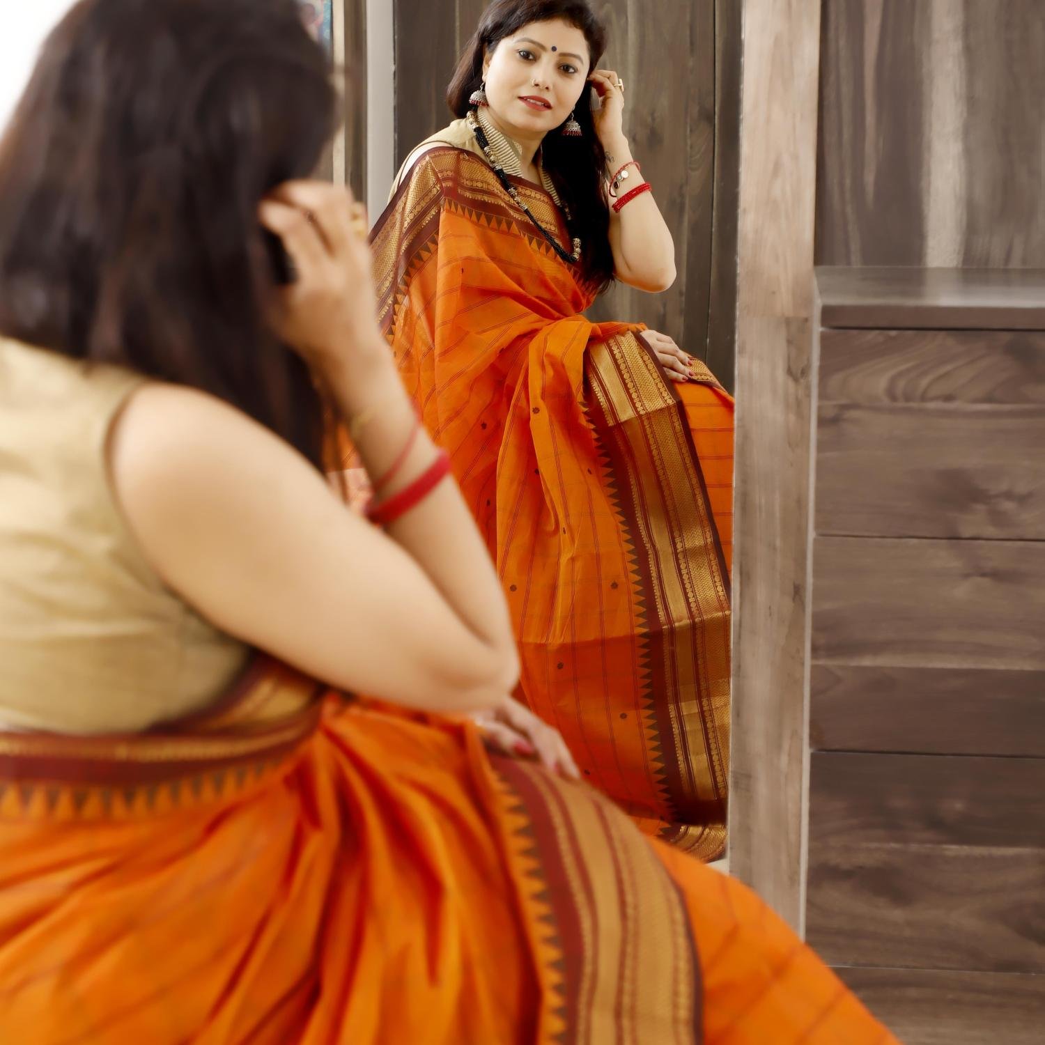 Pure Kanchi Cotton Saree – Orange Body with Brown & Golden Zari Border